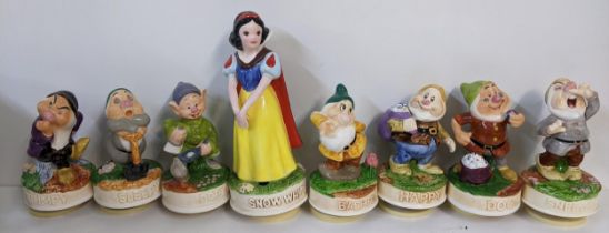 A set of Schmid Snow White and the Seven Dwarfs musical ornaments Location: