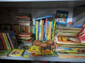 A quantity of children's books, annuals, comics, magazines and other items to include Enid Blyton,