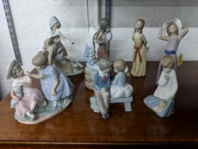 Nine china models, some by Nao and others by Lladro, to include a Nao model of a boy and girl on a