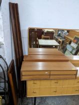 A teak two drawer shelf unit Location: