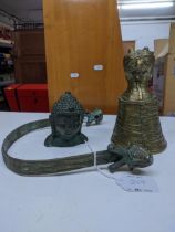 Chinese metal artefacts to include a Tibetan brass mythological animal headed cup shaped ornament,