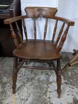 A walnut, elm and beech late 19th/early 20th century Captain's chair, on ring turned legs and double