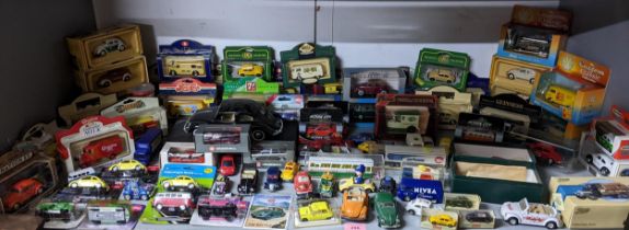 A collection of boxed, packaged and unboxed diecast model cars, to include Lledo Custom and