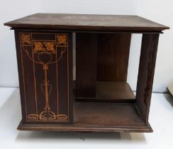 An Art Nouveau inlaid mahogany table top rotating bookcase, Location: