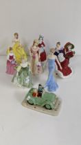 A group of Royal Doulton figurines to include Christmas day 2005, Elaine and others, together with