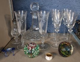 A selection of glassware to include a cut glass ship's decanter, set of six cut small wine