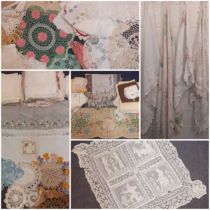 A quantity of vintage linen and crotchet items, mainly mid 20th Century, to include table mats,