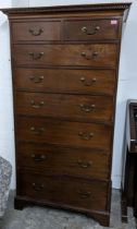 A Victorian mahogany tall chest of short above six graduated long drawers below, a dentil moulded