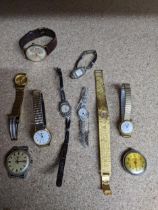A group of vintage ladies and gents manual wind and quartz wrist watches to include a silver cased