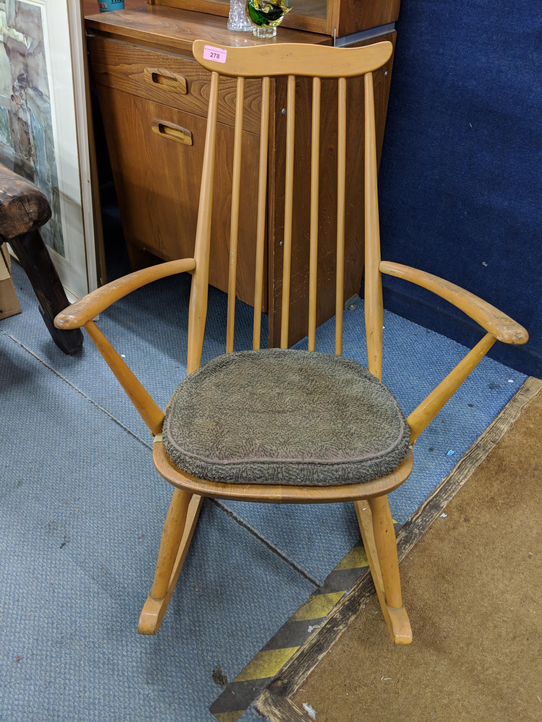 A blonde Ercol Goldsmith rocking chair with an attached brown cushion, Location: - Image 2 of 7