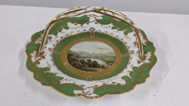 A 19th century hand painted plate decorated with a loch scene and a handle, Location: