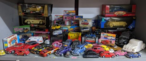 A mixed lot of diecast model cars to include Burago, Solido, Maisto, Majorette Club and Corgi