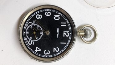 An early 20th century military issued Helvetia black dial open faced pocket watch Location: