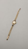 A mid 20th century 9ct gold ladies watch, 7.4g Location: