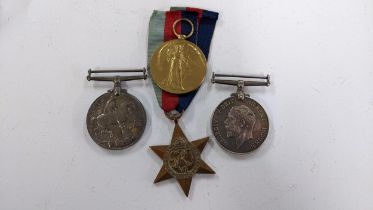 Four Great War medals, two marked S-37629 Pte. W Brown ASC, one marked W Brown and an unmarked