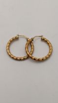 A pair of 9ct gold twisted style hoop earrings, total weight 2.5g Location: