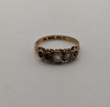 A 15ct gold ring set with paste stones, 2.2g Location: