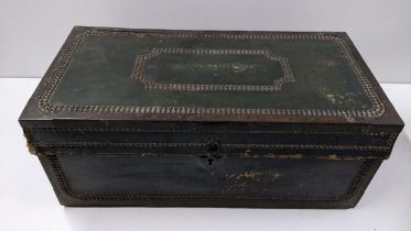 A Regency period green leather and brass bound campaign/ coaching twin handled trunk 26.5hx635.5w