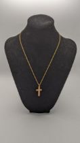 A 9ct gold cross pendant on a 9ct gold rope twist style necklace, total weight 4.2g Location: