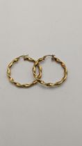 A pair of 9ct gold twisted hoop earrings, total weight 2.6g Location: