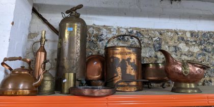 Mixed copper and brass metalware to include a coal scuttle and bucket, garden pump sprayers, brass