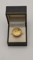 A ½ Sovereign set in a 9ct gold ring, 9.8g Location: