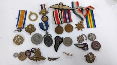 Various medals and cap badges to include a silver Masonic medal, Special Constabulary medal, The