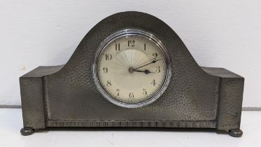 An Arts & Crafts Liberty Tudric pewter hammered mantel clock Location: