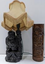 An early 20th century Chinese bamboo brush pot, together with a Chinese carved Buddha table lamp