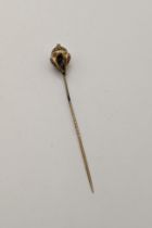A yellow metal Victorian stick pin 2.6g Location:
