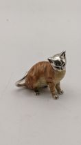 A silver and enamel model of a cat, Location: