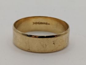 A 9ct gold gent's wedding band, 3.6g Location: