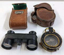 A World War I E Koehn compass and case with opera glasses Location: