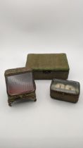 A Shagreen box having a later silver inkwell set in the hinged lid, together with two gilt metal