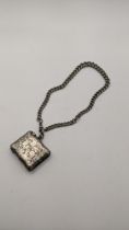 A silver metal vesta case A/F, with a white metal pocket watch chain, total weight 52g Location: