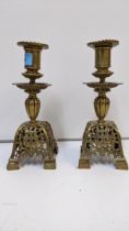 A pair of Victorian brass candlesticks with floral sway ornament, 23cm h Location: