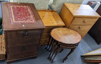 Mixed furniture to include a filing cabinet, two pine chests and a nest of three tables Location: