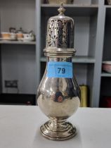 An early 20th century silver sugar shaker Location: