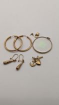 A pair of 9ct gold earrings together with a 9ct gold Faith, Hope and Love charm, and a pair of