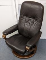 A Stressless brown leather swivel cand reclining armchair, possibly Ekornes Location: