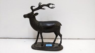 A brass or bronze Chinese stye model of a deer, 28cm high Location: