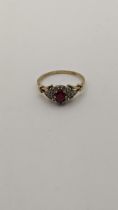 A 9ct gold ruby and diamond ring, 2.9g Location: