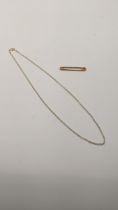 A 9ct gold necklace, together with a 9ct gold bar brooch, total weight 3.1g Location: