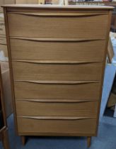 A mid 20thcentury Franck Guille for AustinSuite chest of six drawers on turned tapering legs, 111.