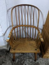 A 19th century Windsor stick back armchair on turned legs and elliptical H-stretchers Location: