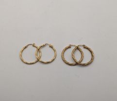 Two pairs of 9ct gold twisted rope style earrings, 2.4g Location: