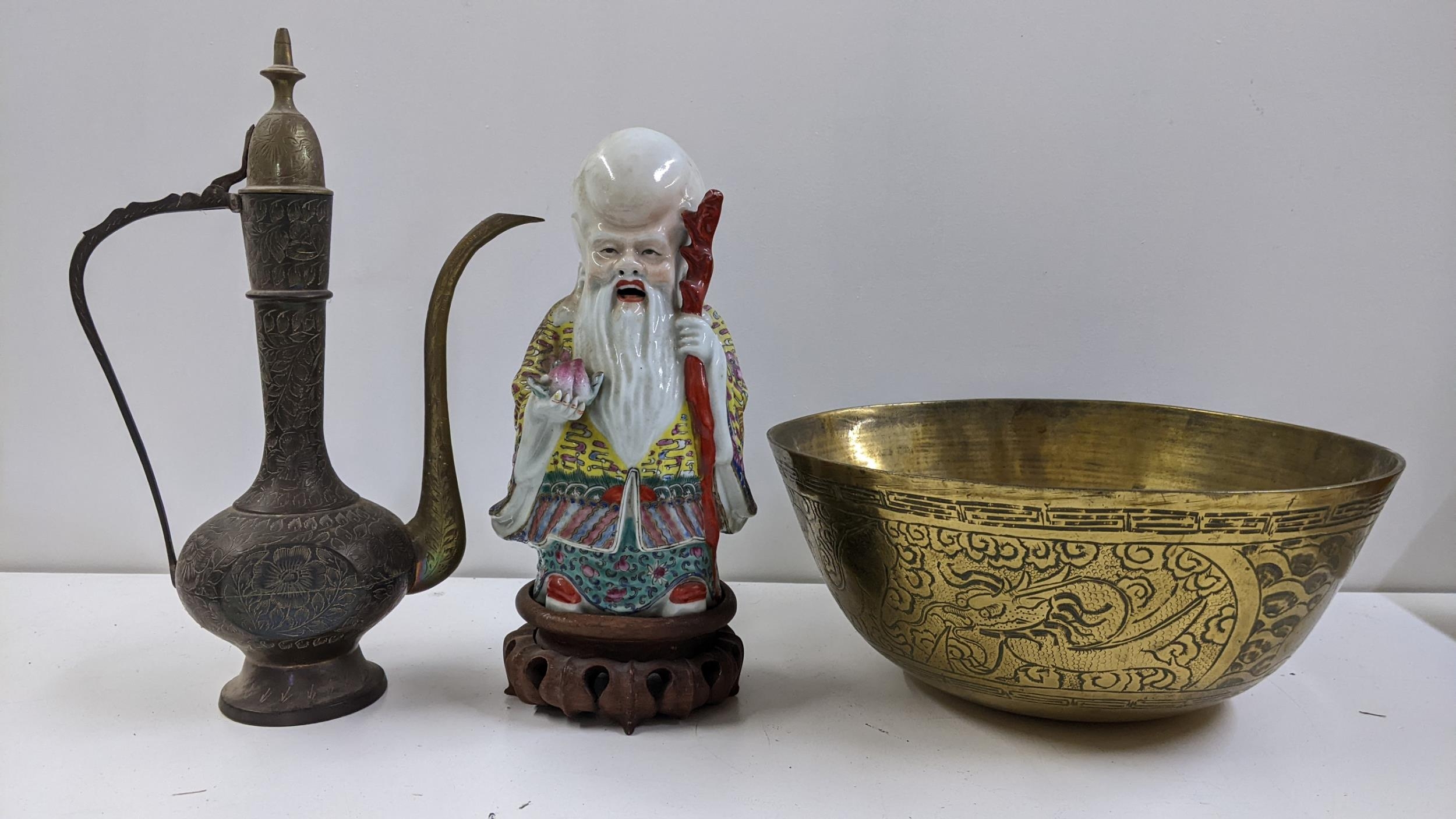 A vintage Chinese famille rose God of Longevity figure, together with a Chinese gilt metal bowl, and