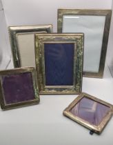 Five silver and white metal photo frames to include a silver photo frame hallmarked Birmingham 1928,