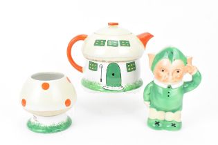 Shelley Mabel Lucie Atwell, a three piece tea service comprising mushroom teapot and sugar basin,