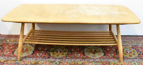 A mid 20th century, Ercol Windsor, elm and beech coffee table, model 459, on splayed supports joined